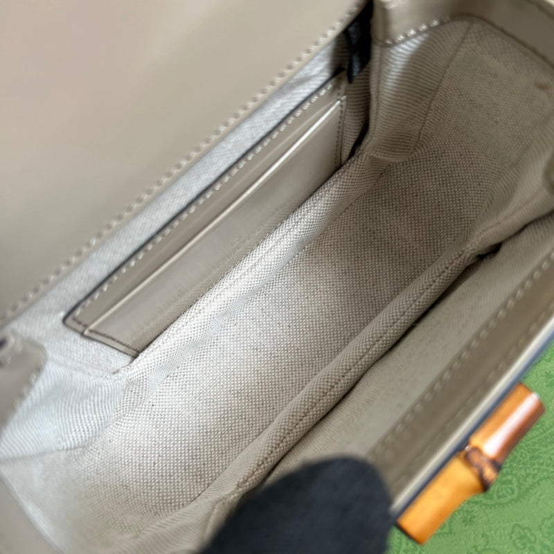 Side view of clean-lined structured handbag