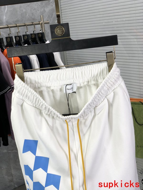 Side profile of Rhude luxury clothing with logo-detail design