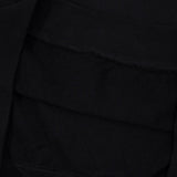 Side profile of Gucci luxury clothing with tailored silhouette
