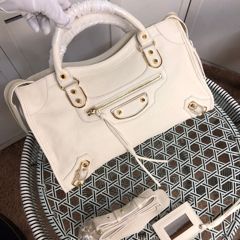 Side profile of polished premium women's handbag – women's statement bag