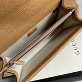 Side profile of modern everyday-luxe women's handbag – women's luxury accessory