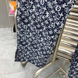 Back view of Louis Vuitton luxury clothing with everyday silhouette