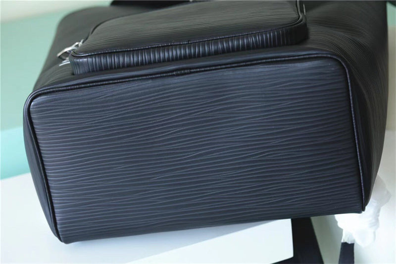  Signature top-handle bag carried on shoulder 16