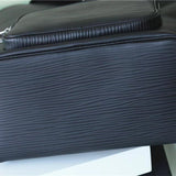  Signature top-handle bag carried on shoulder 16