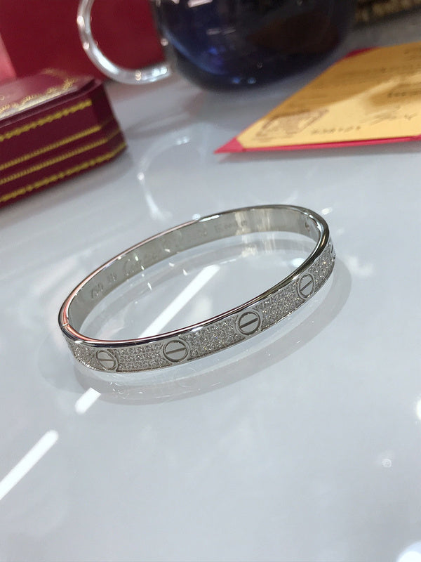 Front view of Cartier unisex jewelry piece