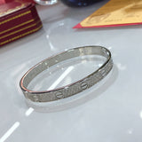 Front view of Cartier unisex jewelry piece