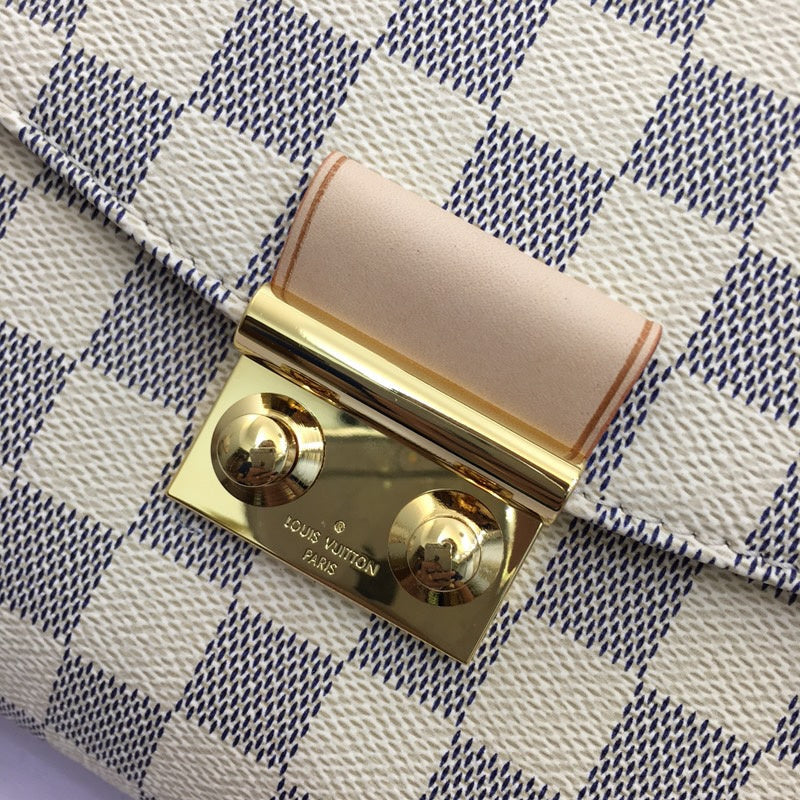 Back view of elevated modern women's handbag – women's luxury accessory