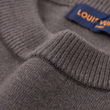 Front view of Louis Vuitton luxury clothing with tailored silhouette