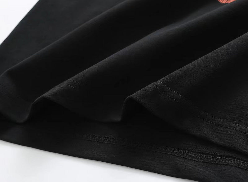 Close-up detail shot of Louis Vuitton cotton t-shirt with monogram-inspired silhouette