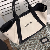 Styled lifestyle shot of refined modern women's handbag – women's luxury accessory