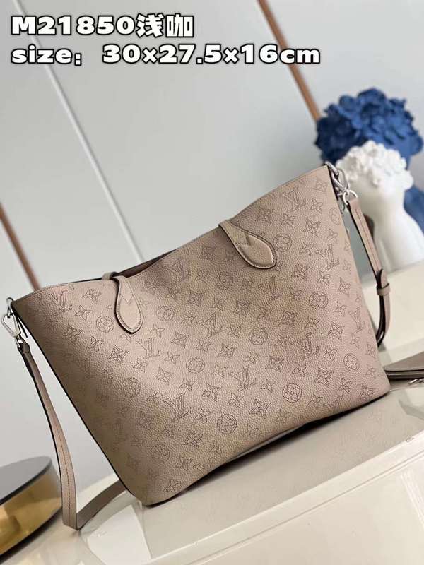Handle and strap detail of chic polished women's handbag – women's luxury handbag