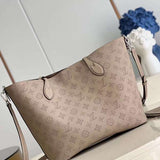 Handle and strap detail of chic polished women's handbag – women's luxury handbag