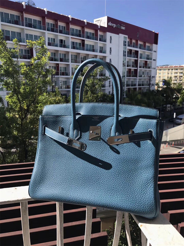  classic top-handle bag styled with outfit 12