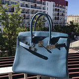  classic top-handle bag styled with outfit 12