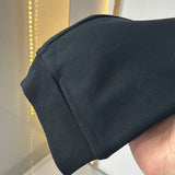 Back view of Louis Vuitton luxury clothing with contemporary cut