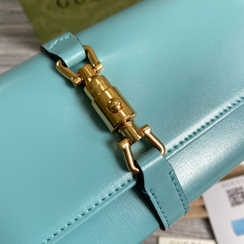 Styled lifestyle shot of modern polished women's handbag – women's premium purse