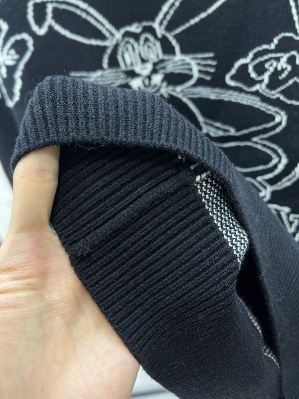 Side profile of Louis Vuitton luxury clothing with label-forward styling