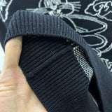 Side profile of Louis Vuitton luxury clothing with label-forward styling