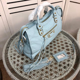 Handle and strap detail of statement chic women's handbag – women's statement bag