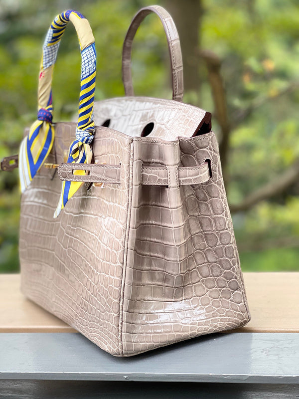 Side view of structured structured handbag