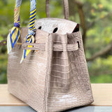 Side view of structured structured handbag