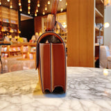 Curated top-handle bag carried on shoulder 16