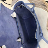 Side profile of modern structured women's handbag – women's designer-style accessory
