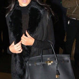 Side view of refined structured handbag