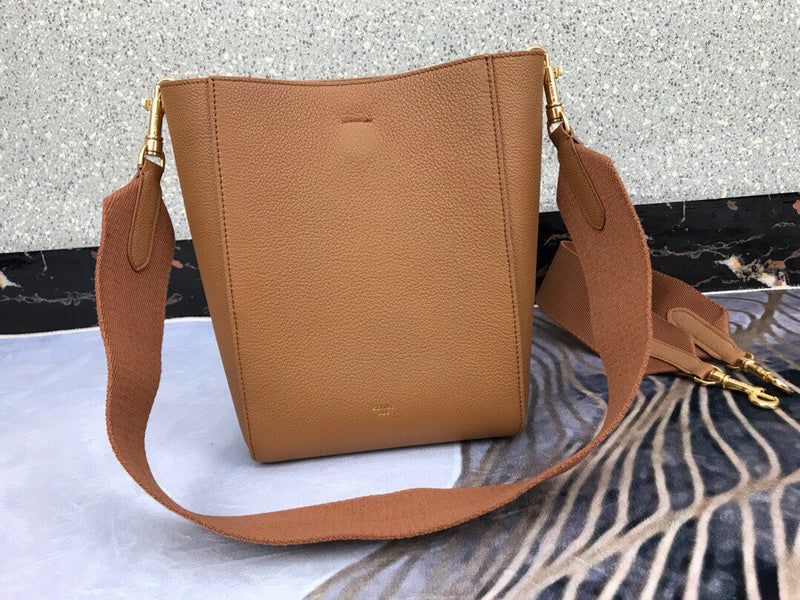 Handle and strap detail of structured statement women's handbag – women's designer-style accessory