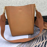 Handle and strap detail of structured statement women's handbag – women's designer-style accessory