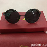 Close-up detail view of Cartier unisex sunglasses