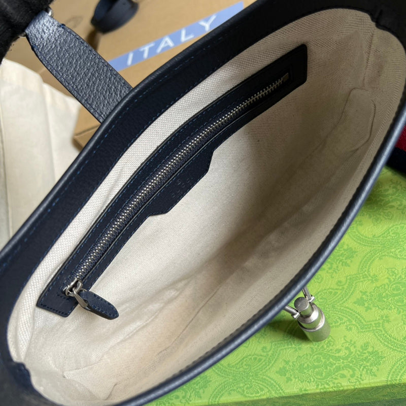 Close-up detail of premium signature women's handbag – women's luxury handbag