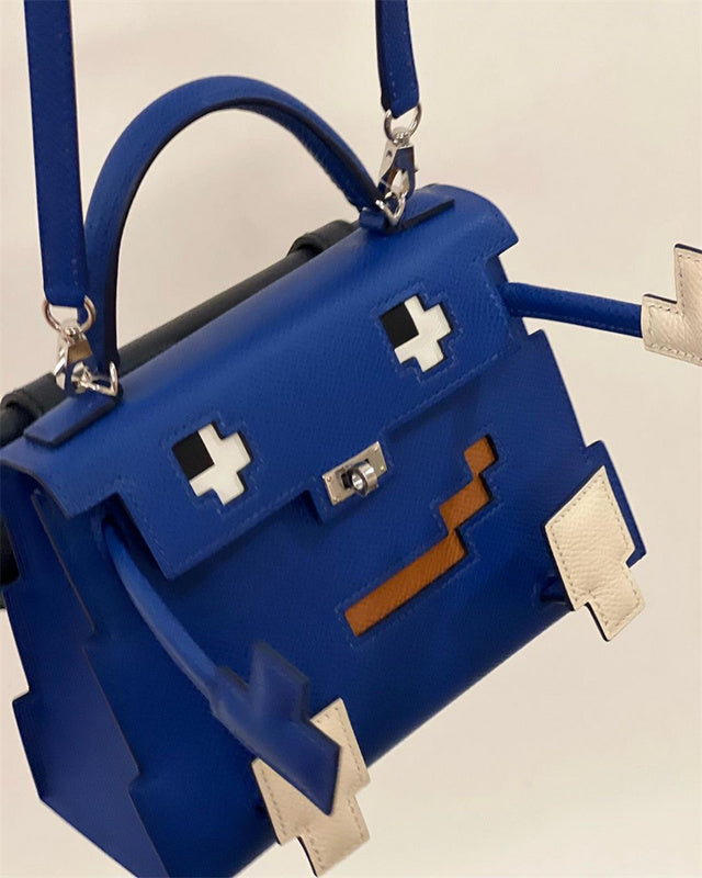 Side view of understated structured handbag