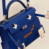 Side view of understated structured handbag