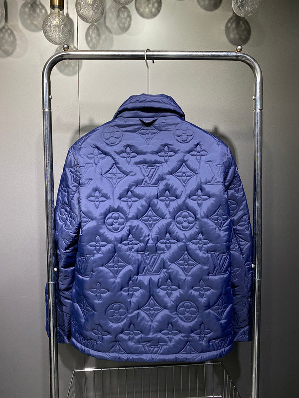 Full styled look of Louis Vuitton luxury clothing with label-forward styling