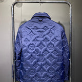 Full styled look of Louis Vuitton luxury clothing with label-forward styling