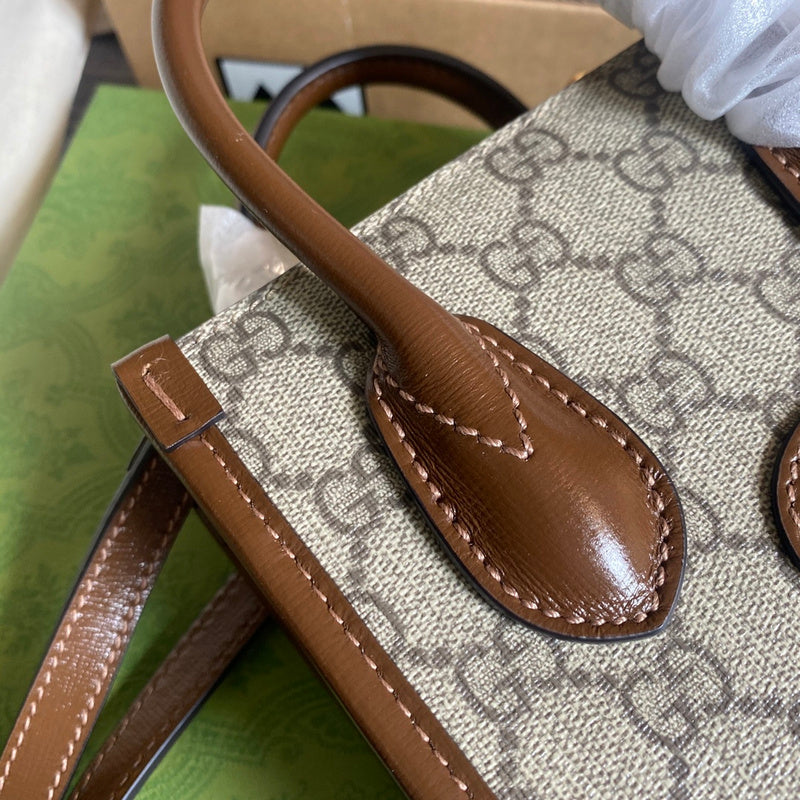 Close-up detail of polished signature women's handbag – women's premium purse