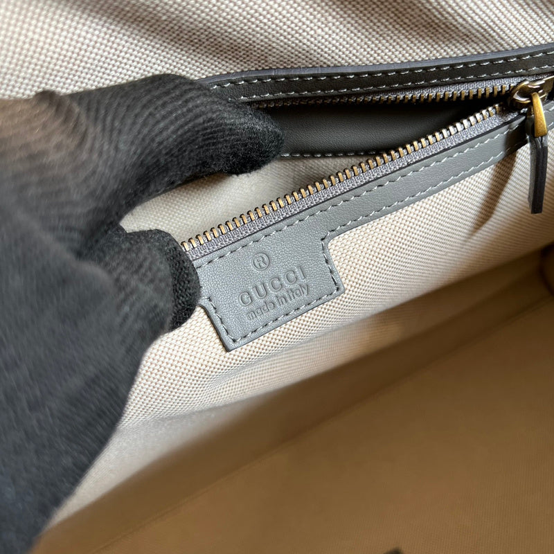 Side view of chic structured handbag