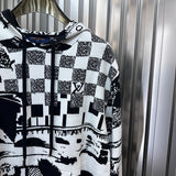 Full styled look of Louis Vuitton luxury clothing with everyday silhouette