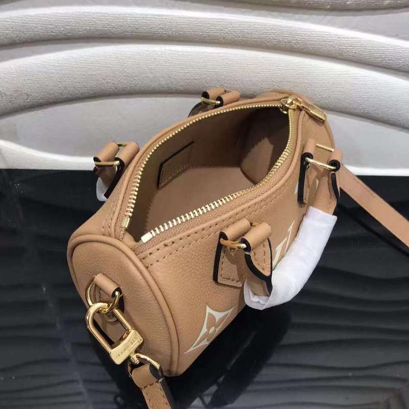 Side profile of modern sleek women's handbag – women's luxury handbag