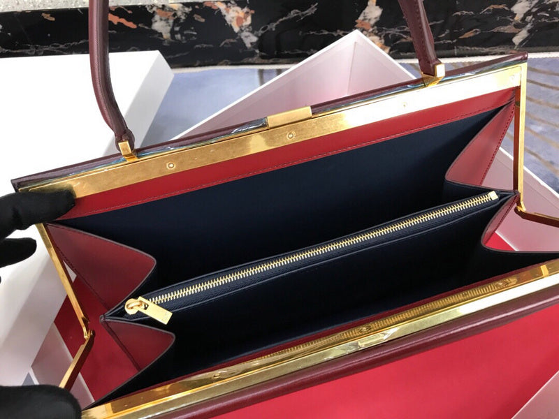 Side profile of everyday-luxe polished women's handbag – women's luxury handbag