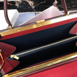 Side profile of everyday-luxe polished women's handbag – women's luxury handbag