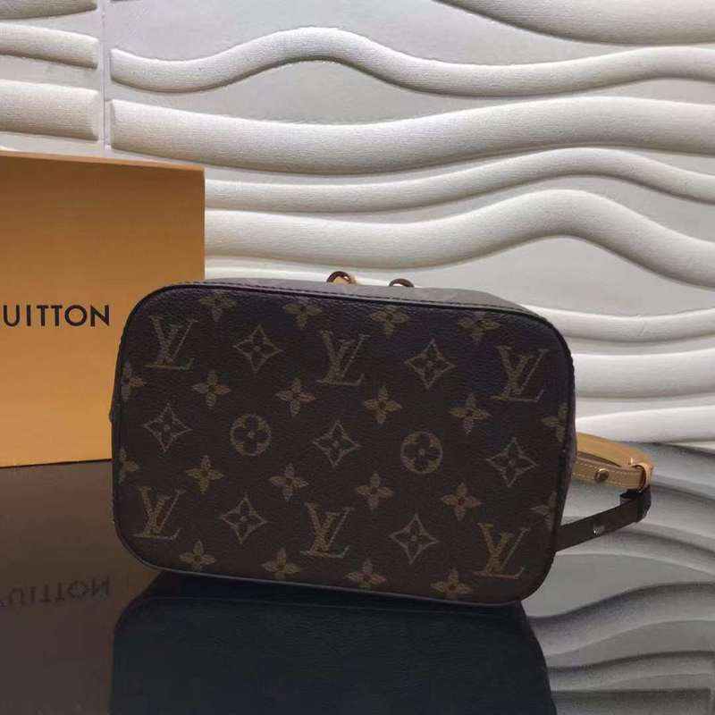 Styled lifestyle shot of modern signature women's handbag – women's luxury accessory