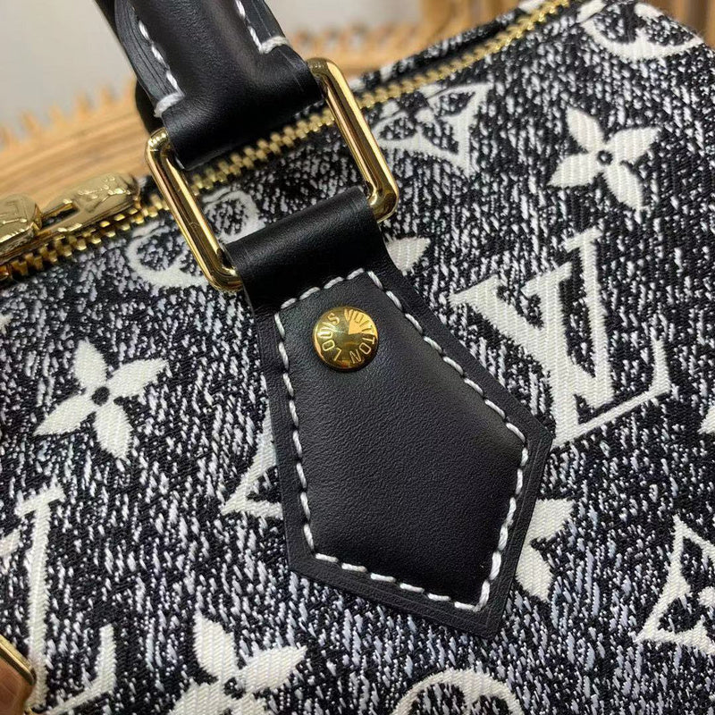Handle and strap detail of refined modern women's handbag – women's luxury handbag