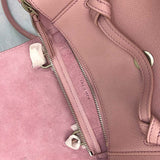 Top view of modern polished women's handbag – women's luxury accessory