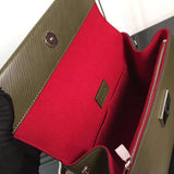 Close-up detail of structured signature women's handbag – women's premium purse