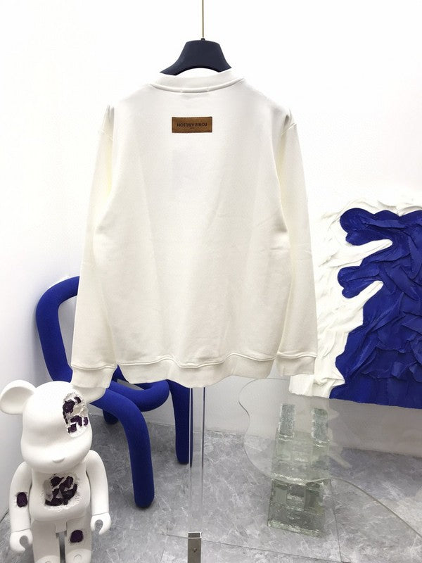 Back view of Louis Vuitton luxury clothing with runway-inspired design