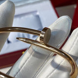 Side view of Cartier unisex jewelry piece