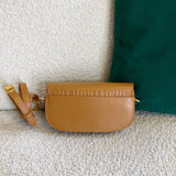 Close-up detail of premium sleek women's handbag – women's luxury accessory