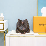Side profile of refined sleek women's handbag – women's luxury accessory